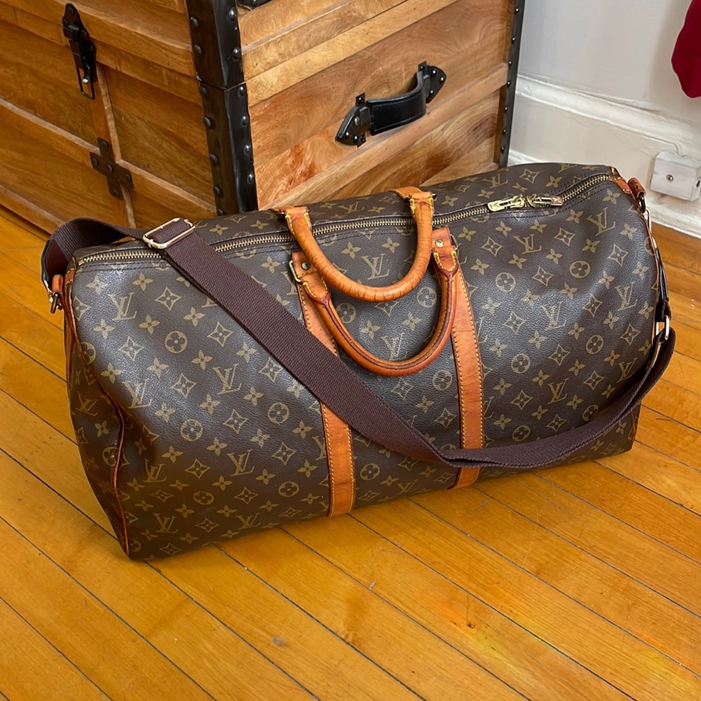 A Beautiful Vintage Louis Vuitton Bandouliere Keepall 55 Travel Bag.